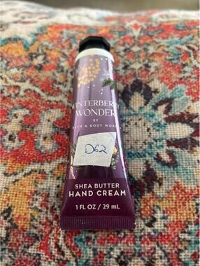 D62  1 Bath and Body Works hand cream 1 oz winterberry wonder